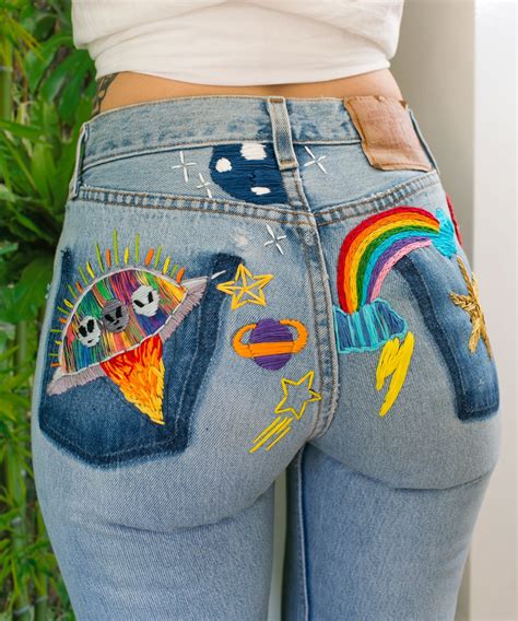 Женские джинсы с рисунками - 81 фото