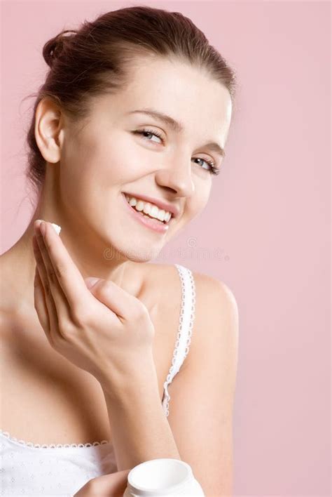 Beautiful Brunette Applying Cosmetic Cream Stock Photo Image Of Care Elegant