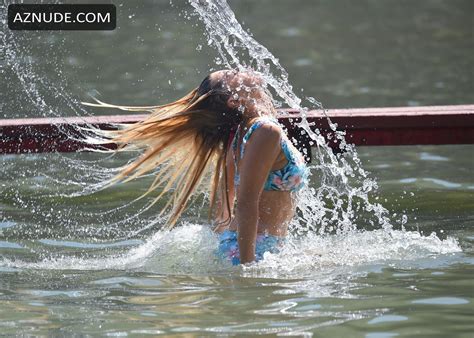 Sophie Monk Sexy In A Blue Bikini While Filming Tv Show With Oscar Gordon On The Beach In