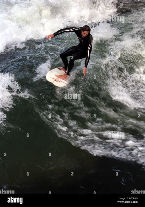 Surfer On The So Called Stehende Welle Standing Wave Of The Eisbach