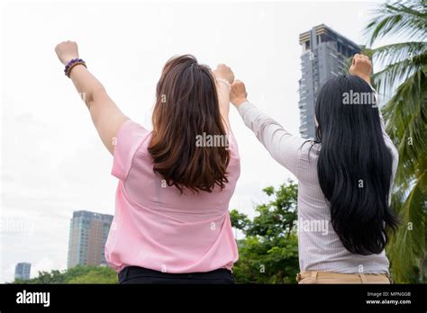 Two Mature Asian Women Together Relaxing At The Park Stock Photo Alamy