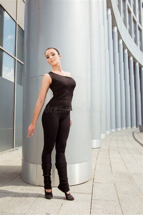 Slender Graceful Brunette Female Model In Blue Lingerie Posing Sitting