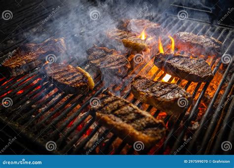 Steaks Cooking Over Flaming Grill Stock Photo Image Of Smoke