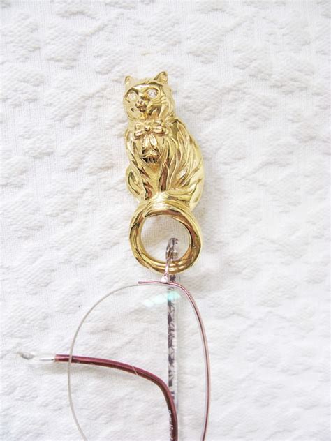 Vintage Avon Jewelry Cat Eyeglass Holder Pin Sunglass… Gem