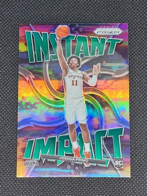 2021 22 Panini Prizm Instant Impact Green Prizm 12 Joshua Primo RC