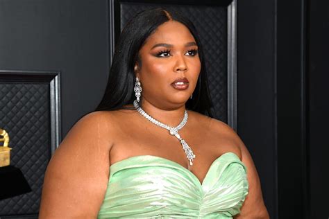 Lizzo Soaks Up The Sun In Steamy Bikini Pics This What It Looks Like If I Did A Push Up On You