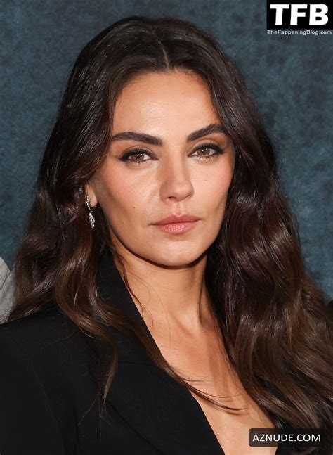 Mila Kunis Sexy Seen Flaunting Her Hot Cleavage On The Red Carpet At The Premiere Of Luckiest