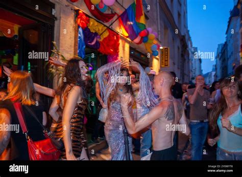 Paris France LGBTQI Public Crowd People Celebrating In The Marais District Night Gay Bar