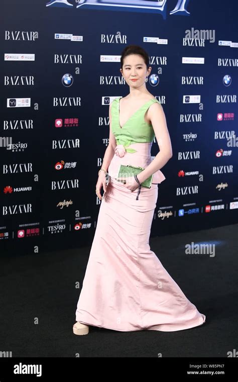 Chinese Actress Liu Yifei Arrives On The Red Carpet For The 2016 Bazaar