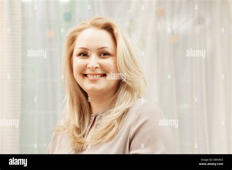 Smiling Middle Aged Blonde Stock Photo Alamy