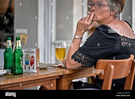 Mature Woman Smoking Hi Res Stock Photography And Images Alamy