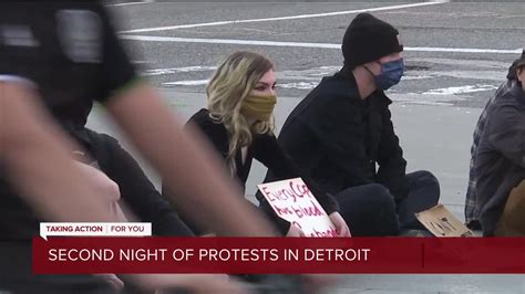 Tear gas deployed, protesters face off with police in downtown Detroit