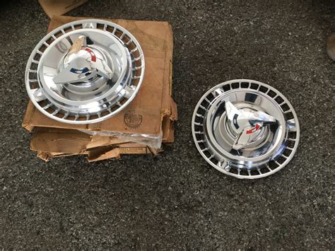 1961 Impala Ss Nos Hubcaps At Kissimmee 2017 As Q49 Mecum Auctions