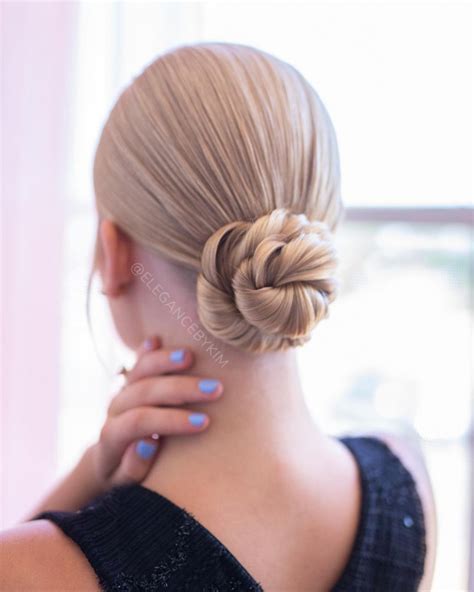 40 Beautiful Updo Hairstyles For 2022 Elegant Twist Low Bun