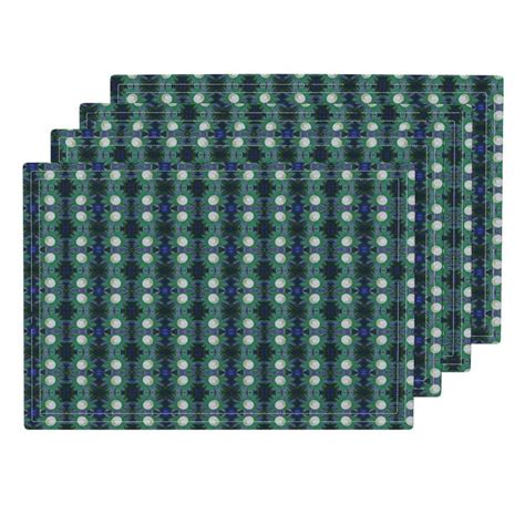 Four Pieces Of Green And White Patterned Paper With Circles On The