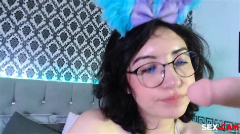 Nerdy Model With That Pink Dildo In Her Mouth