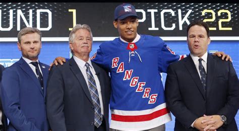 Rangers sign K’Andre Miller to three-year, entry-level contract ...