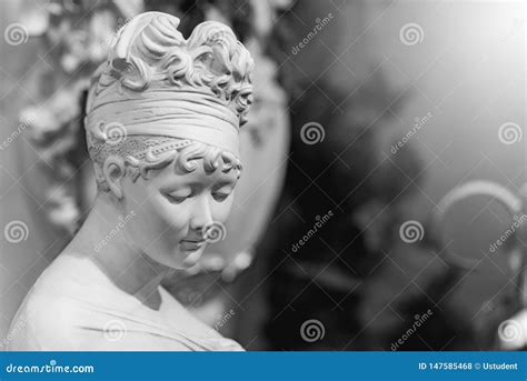 Statue Of A Naked Woman On A Black Background Royalty Free Stock Image Cartoondealer