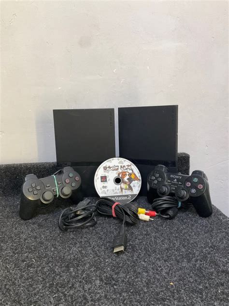 2 Sony Play Station 2 - Console with games (1) - Catawiki