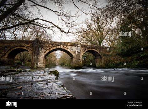 Motion Blur Shot Of New Bridge Over The River Dart Dartmoor Stock