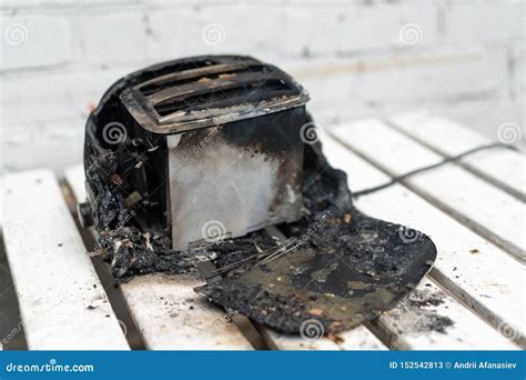 Burning Toaster Toaster With Two Slices Of Toast Caught On Fire Over