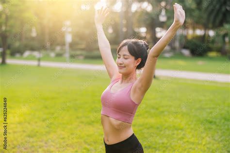 Joy Of A Happy Fit Female Jogger In Her S Asian Woman Wearing Pink