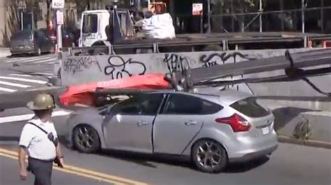 Nyc Driver Escapes With Minor Injuries As Crane Crushes Car Autoblog