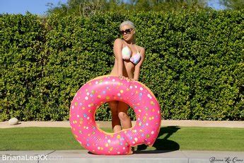 Seductive Briana Lee Poses Naked By The Pool Photos