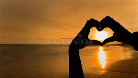 Hands with a Heart Shape at Sunset on a Beach Stock Photo - Image of ...