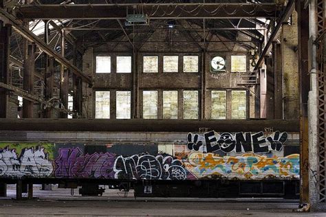 Abandoned warehouse and graffiti covered train | Street art graffiti, Abandoned warehouse ...