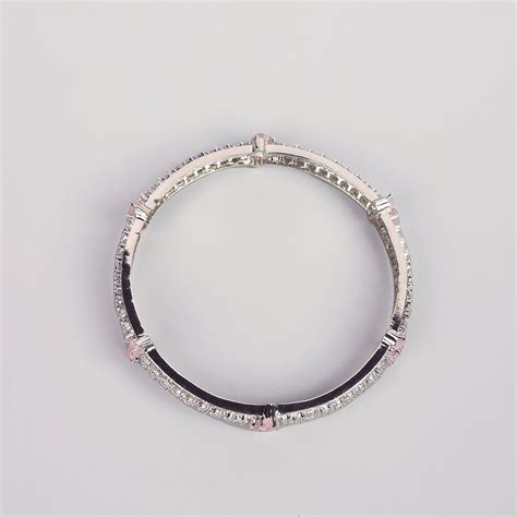 Buy Niscka Silver Plated White And Pink American Diamond Bangles Set