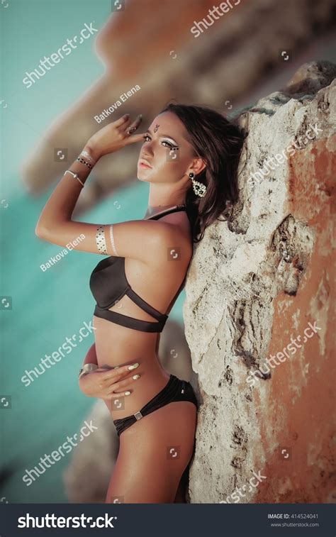 Gorgeous Tanned Brunette Swimsuit On Beach Stock Photo