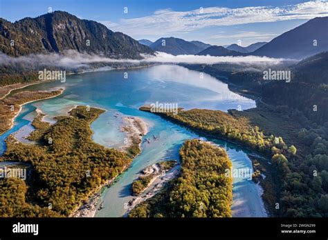 Aerial View Of Riverbed And Lake With Mountains Sunny Sylvenstein