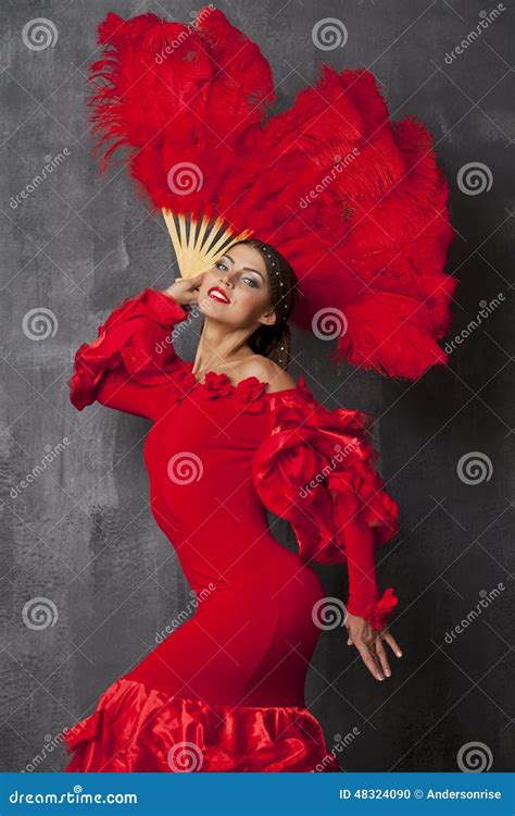 Woman Traditional Spanish Flamenco Dancer Dancing In A Red Dress Stock