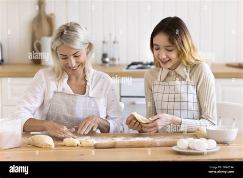 Happy Mature Grandma Enjoying Friendship With Teenage Granddaughter Stock Photo Alamy