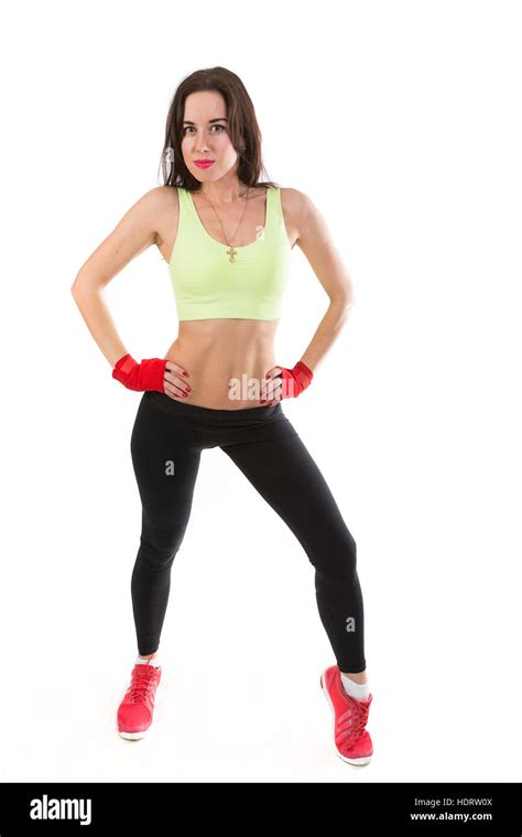 Attractive Brunette In Sportswear On A White Background Stock Photo Alamy