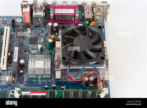 Cpu Cooler Fan Is Installing On Old Motherboard Stock Photo Alamy