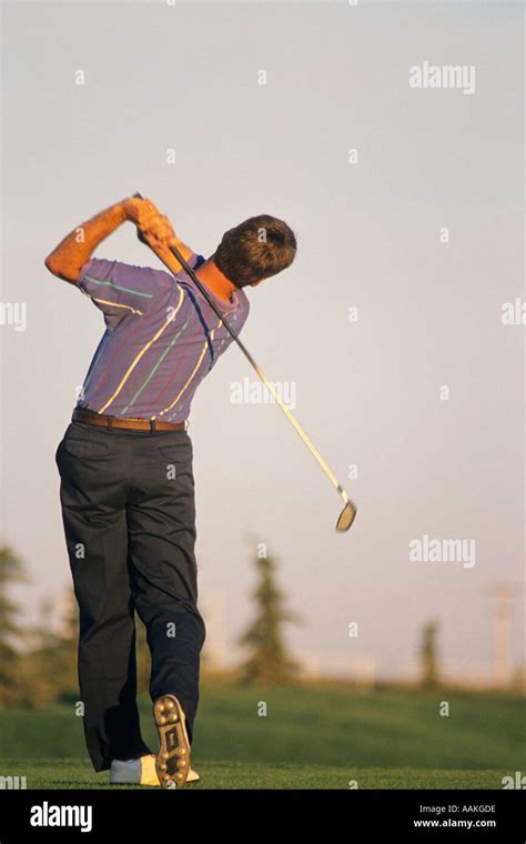 Golfer and golf swing Stock Photo - Alamy