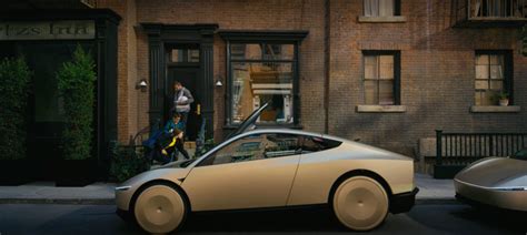 Elon Musk Shows Off Teslas Long Awaited Robotaxi Business Insider