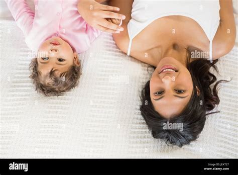 Brunette Playing With Her Baby Stock Photo Alamy