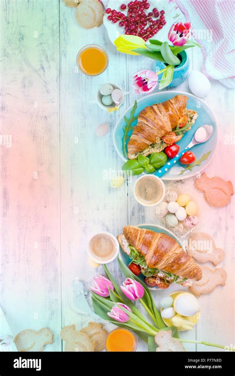 Easter breakfast. A family breakfast of croissants with rocket salad ...