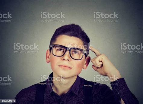 Portrait Confused Thinking Young Man Bewildered Scratching His Head