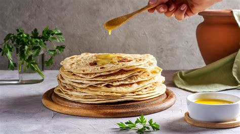 The Key Difference Between Naan And Roti Bread