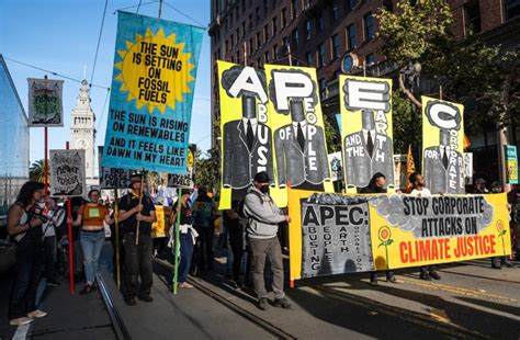 'No to APEC' coalition of activists march from Embarcadero to Moscone Center