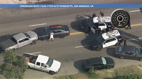 'Peaceful but not graceful': Stolen vehicle suspect's pants get stuck while trying to surrender after L.A. chase