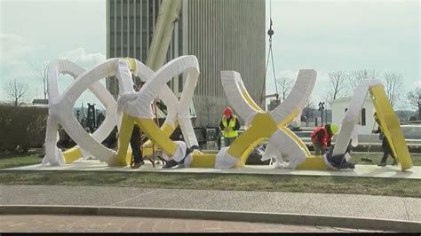 'Trio' sculpture permanently installed at Empire State Plaza after restoration