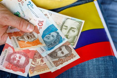 pesos colombianos para real