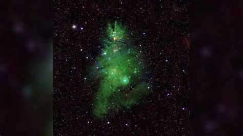 ‘Christmas Tree Cluster’ and a celestial snow globe sparkle in new, starry NASA images