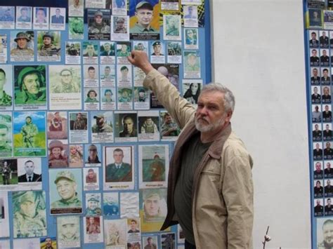 ‘Hero to me’: Kyiv’s memory wall a reminder of losses in Ukraine-Russian conflicts