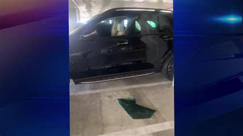 ‘I definitely don’t feel safe’: Vandals smash over a dozen car windows in Midtown parking garage amid string of break-ins